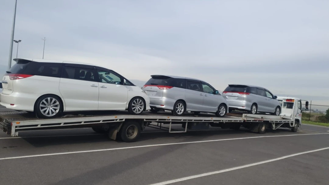 A Car Transport Carrier is carrying the cars
